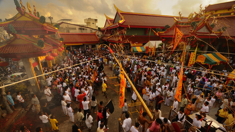 People attending Phuket Vegetarian Festival