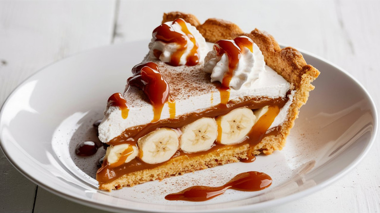 Banoffee pie on white plate and table