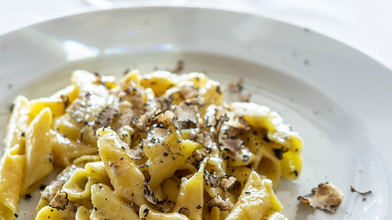 Pasta topped with cream and truffle