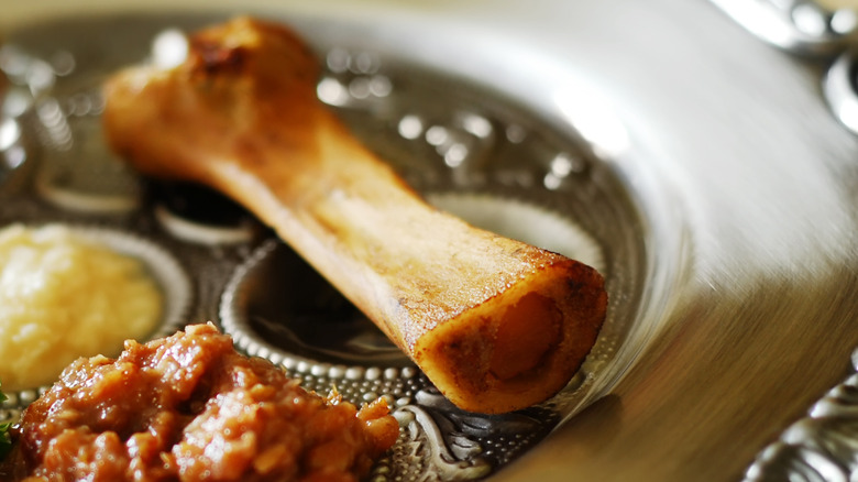 Roasted shank bone on platter