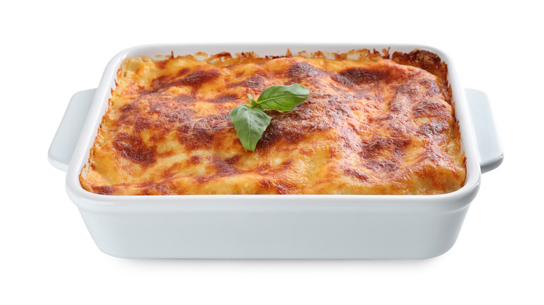 homemade lasagna in white pan