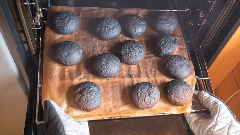 burned bread loaves in oven