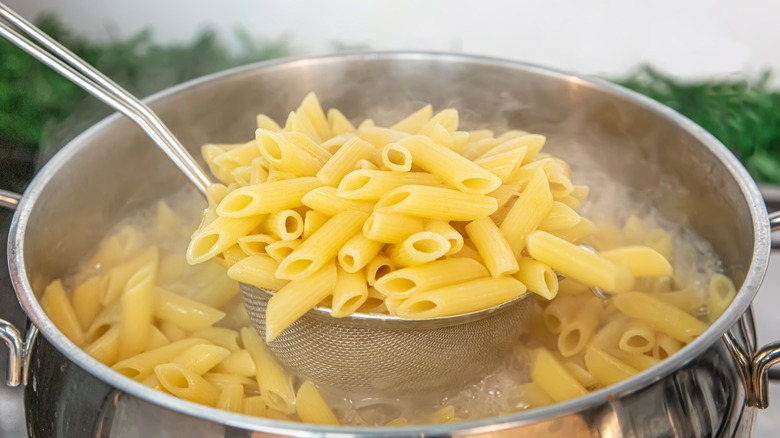 pot of boiling penne pasta