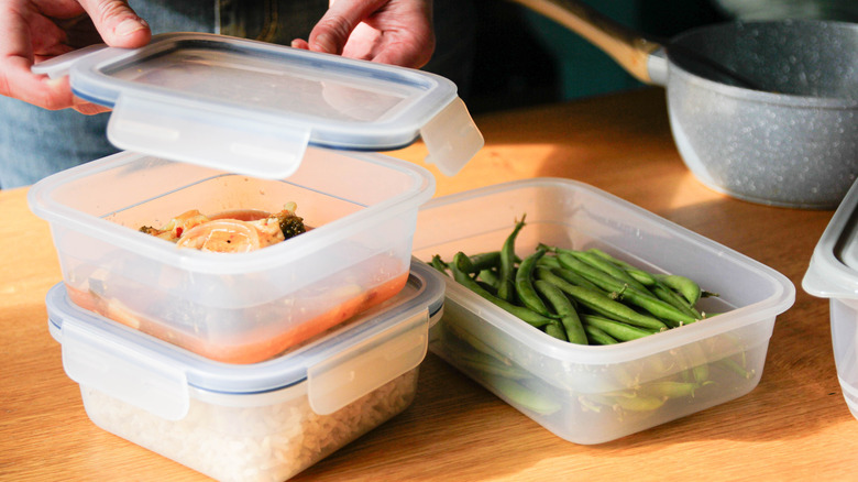 food containers filled with variety of meals