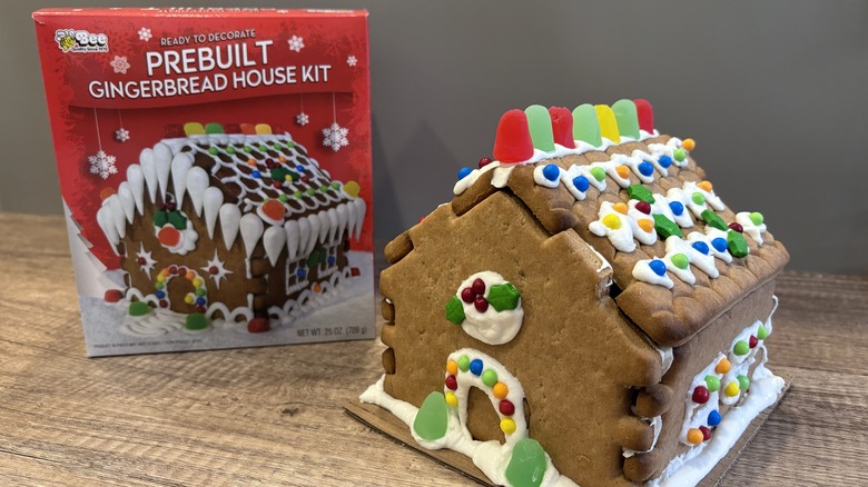 Bee Prebuilt Gingerbread House next to the packaging