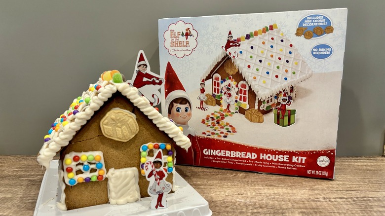 Elf on a Shelf House next to the packaging