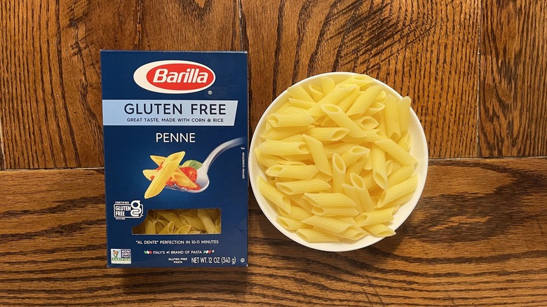 barilla pasta and box on wood table