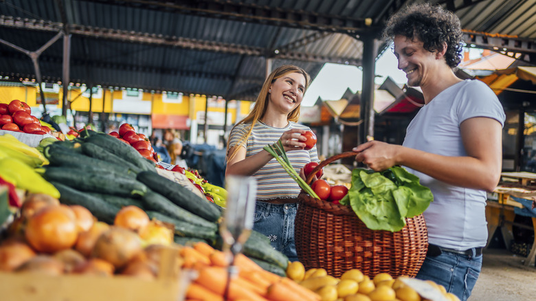 People shopping at farmers market