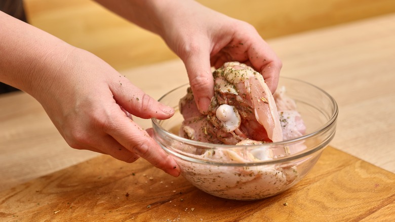 handling raw chicken