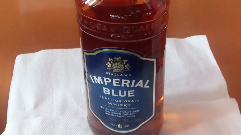 Imperial Blue Whisky on table