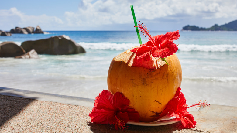 Tropical cocktail served in coconut