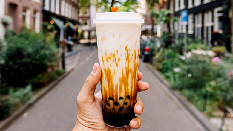 handheld brown sugar boba drink