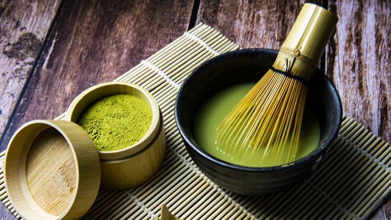 matcha powder and bamboo whisk