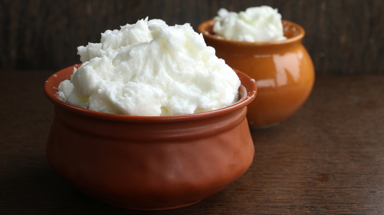 Indian Makhan in ceramic orange bowls