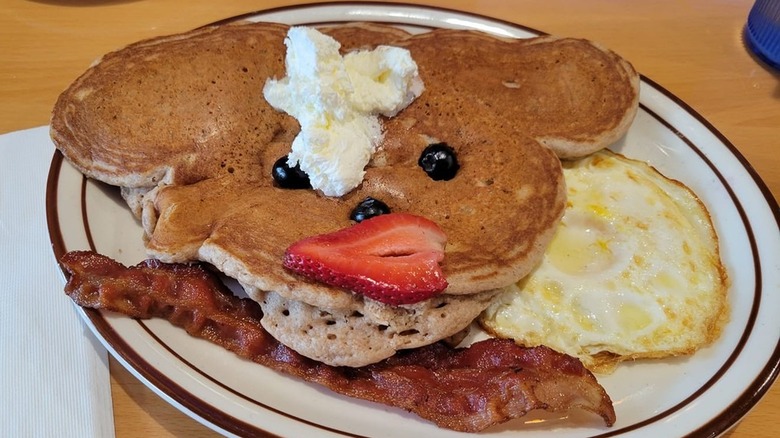 Kids' pancakes, eggs, and bacon