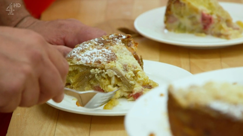 underdone fruit cake being eaten with fork