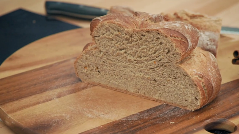 underproved baked bread on board