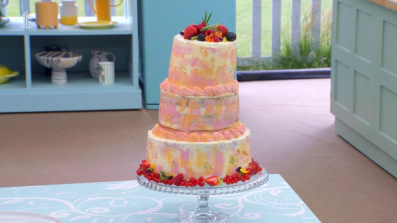 genoise sponge cake on glass display tray