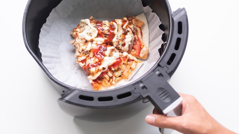 Air fryer lined with parchment paper