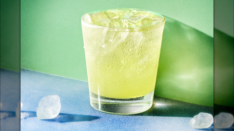 Applebee's dollar margarita on a green and blue background