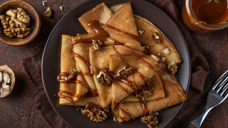 folded crepes with drizzled caramel