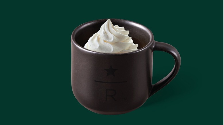 grey coffee mug with whipped cream