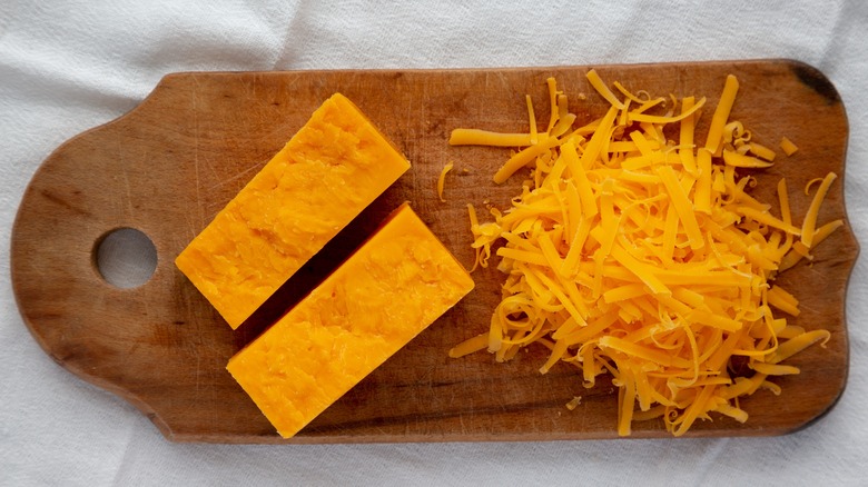 Cheddar cheese block and grated