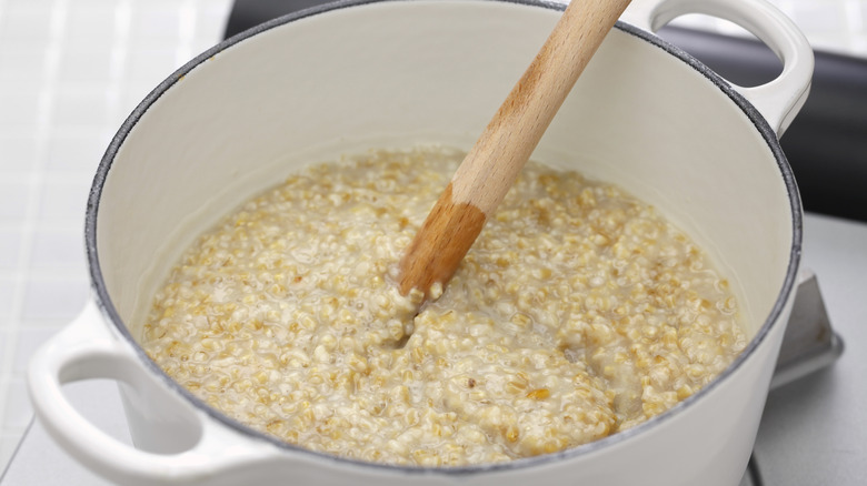 Pot of oatmeal with spoon