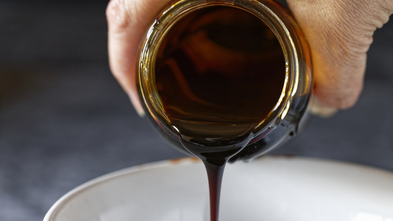 Molasses pouring out of jar