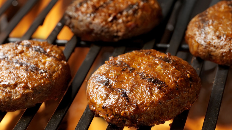 hamburger patties on grill