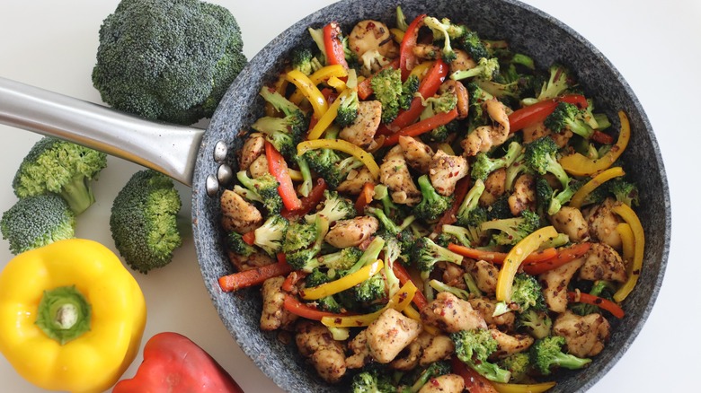 chicken and vegetables in pan