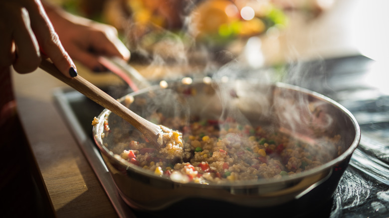 stirring sauté pan