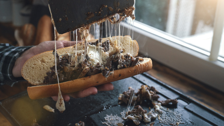 Philly cheesesteak cheese pull