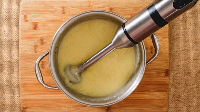 Immersion blender in soup