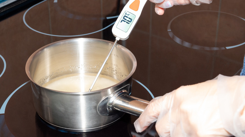 Candy thermometer in pot