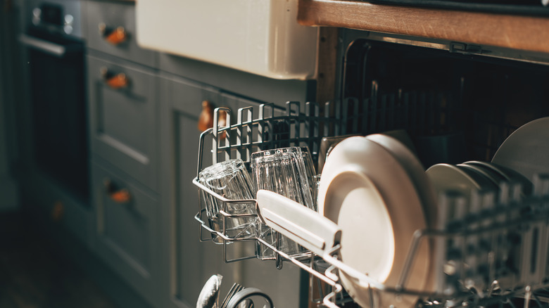 Open dishwasher with racks