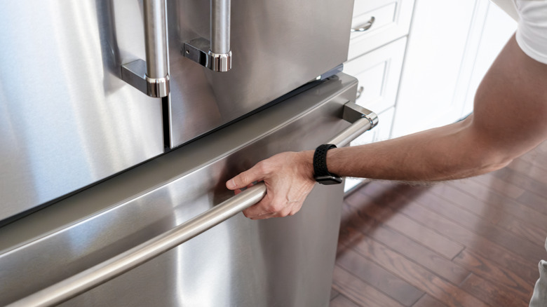 Man opening the freezer