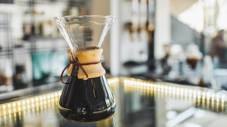 a glass jar filled with cold brew coffee