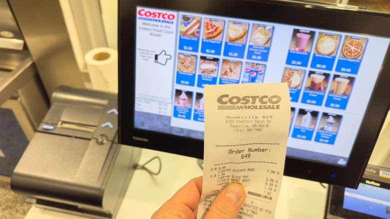 Costco bill with computer screen