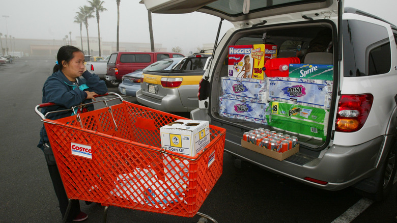 person loading car at Costco