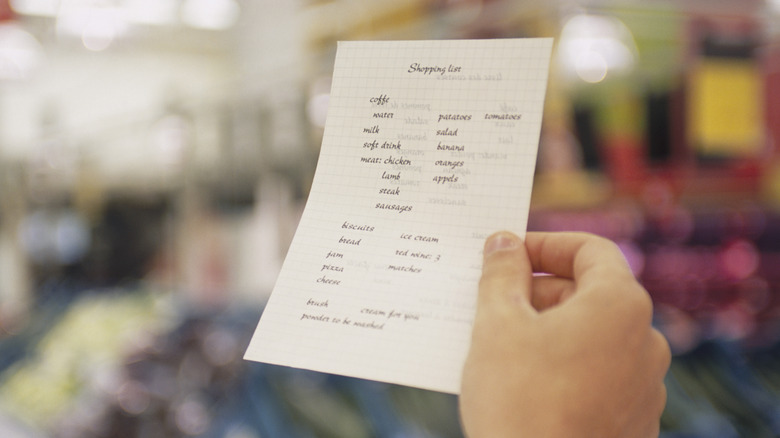 person with shopping list