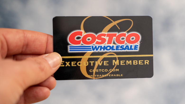 hand holding Costco membership card