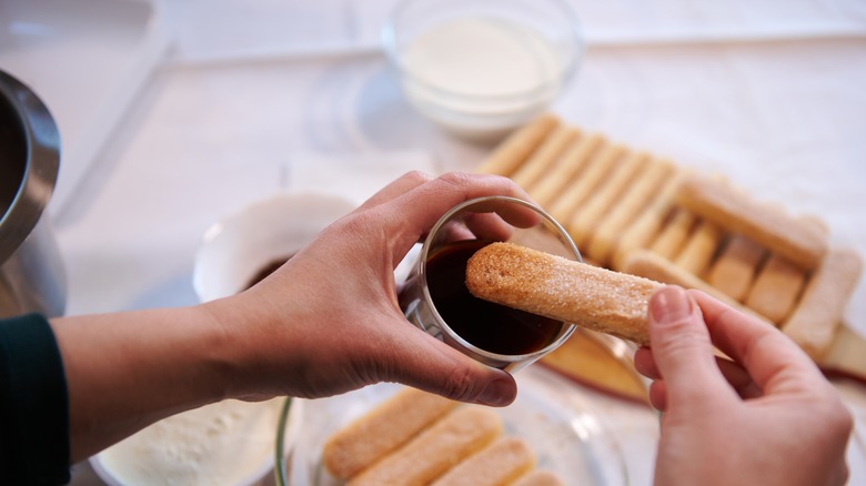 Dipping ladyfingers in espresso