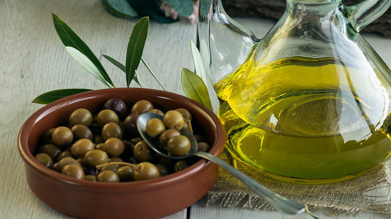 Arbequina olive oil and olives