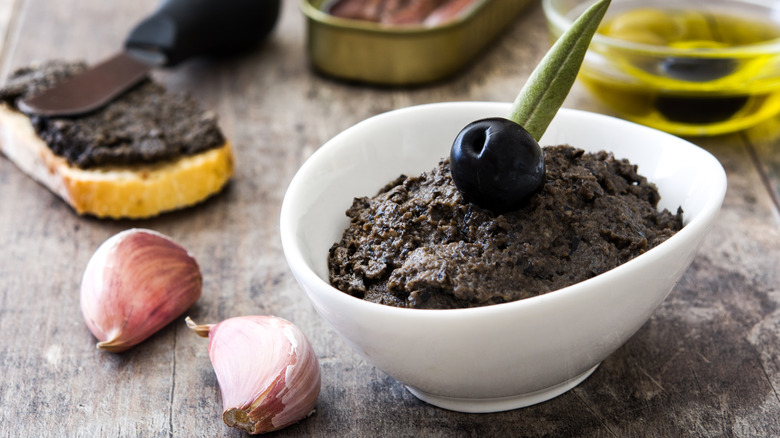 Olive tapenade, garlic, and bread