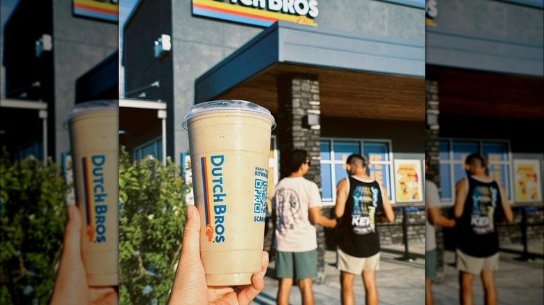 Person holding DutchBros coffee