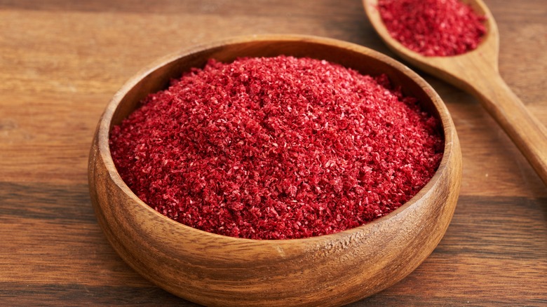 ground sumac in a wooden bowl