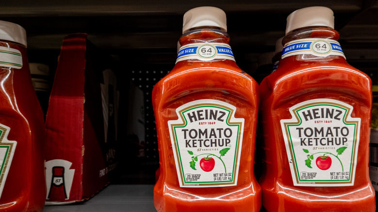 Ketchup bottles on a shelf