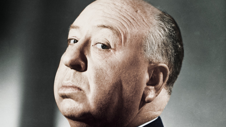 Alfred Hitchcock posing