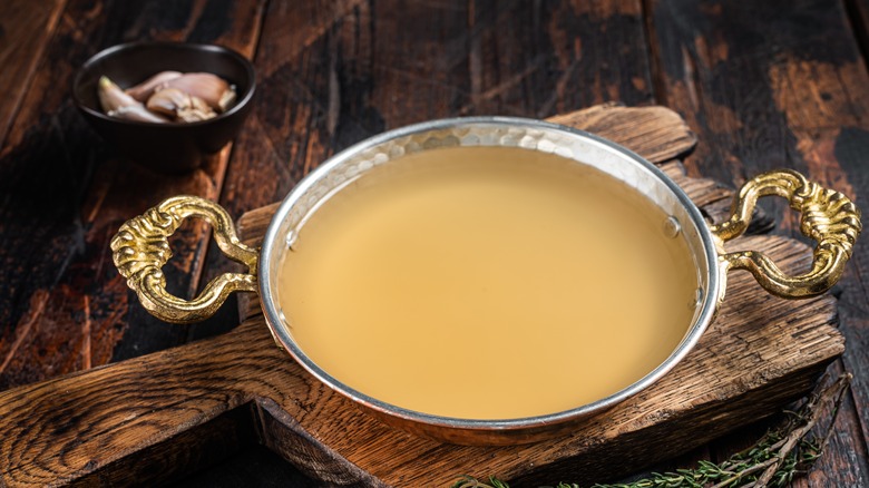 Beef stock in pan